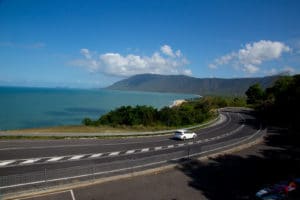 A Beach Highway Looking Over The Mountains And Ocean