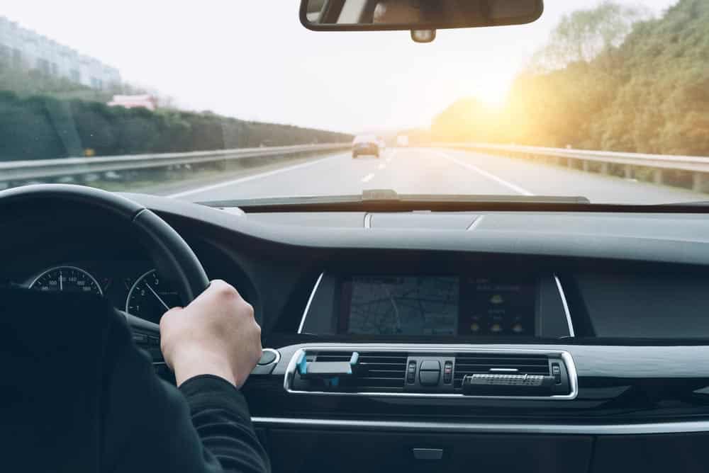 Man Driving A Car For A Road Trip